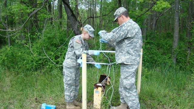Technicians working in a mobile medical laboratory
